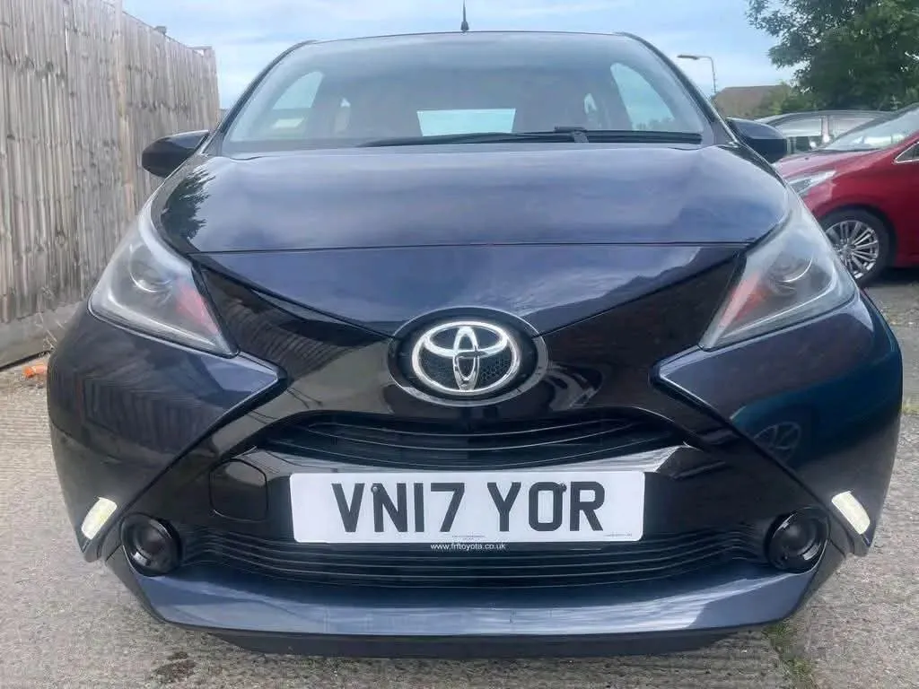 Dark blue Toyota Aygo, front view showing the registration VN17 YOR