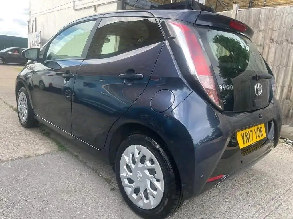 Dark blue Toyota Aygo, rear three-quarter view from the nearside
