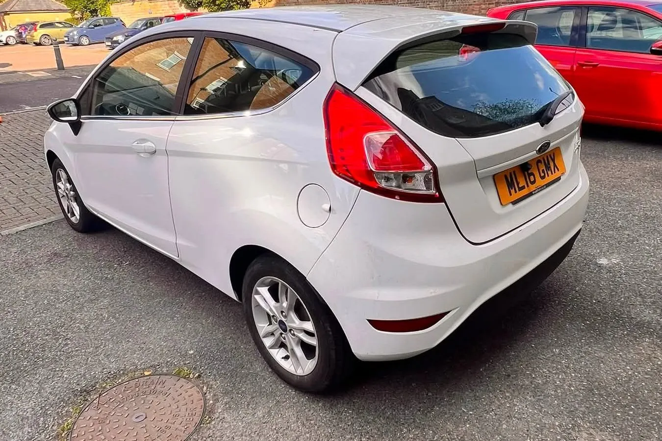 White Ford Fiesta 1.6 automatic, rear three-quarter view